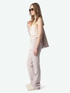 Pistol Pants - Sleek, sharp, and effortlessly cool. The Pistol trousers blend tailored precision with a relaxed fit, elevated by subtly shimmering thread for a hint of unexpected shine. Dress them up, dress them down—always with an edge.