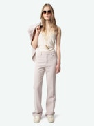 Pistol Pants - Sleek, sharp, and effortlessly cool. The Pistol trousers blend tailored precision with a relaxed fit, elevated by subtly shimmering thread for a hint of unexpected shine. Dress them up, dress them down—always with an edge.