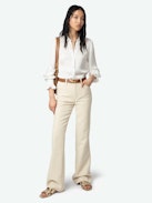 Pistol Pants - A masterful blend of classic tailoring and modern sophistication. These flared, tailored pants are crafted from premium cotton with a refined weave, offering a structured yet comfortable fit. Featuring practical pockets and a sleek silhouette, the Pistol Pants transition effortlessly from day to night.