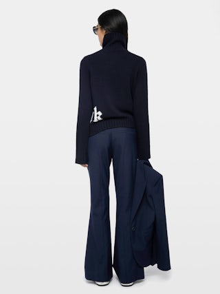 Prevy Trousers - Flared tailored trousers in mixed wool twill.