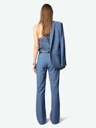 Pistol Pants - Flared tailored pants with pockets and pleats in a mottled fabric.