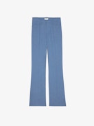 Pistol Pants - Flared tailored pants with pockets and pleats in a mottled fabric.