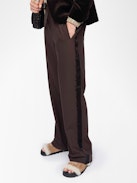 Poma Pants - Straight-cut tailored pants with a jogging-inspired design, featuring satin stripes and an elastic waistband.