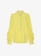 Timmy Blouse - Light yellow cotton blouse with long sleeves and ruffles.
