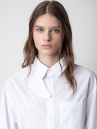 Camicia Tyrone - Camicia lunga in cotone bianco con bottoni, tasche e colletto con protezione rimovibile.