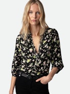 Twina Soft Crinkle Roses Shirt - Embrace timeless elegance with this women’s black roses blouse, adorned with a delicate floral print. Featuring a round, buttoned neckline and half-button closure, this blouse offers a sophisticated yet romantic look. The long sleeves with tailored cuffs provide a polished finish, making it perfect for both casual outings and formal occasions.