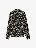 Twina Soft Crinkle Roses Shirt - Embrace timeless elegance with this women’s black roses blouse, adorned with a delicate floral print. Featuring a round, buttoned neckline and half-button closure, this blouse offers a sophisticated yet romantic look. The long sleeves with tailored cuffs provide a polished finish, making it perfect for both casual outings and formal occasions.