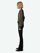 Tandy Blouse - Sheer black shirt with round neckline, button fastening, long ruffled sleeves and sequin embellishment.