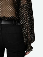 Tandy Blouse - Sheer black shirt with round neckline, button fastening, long ruffled sleeves and sequin embellishment.