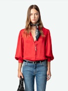 Trenta Satin Blouse - Long-sleeved satin blouse with buttoned V-neck and gathered shoulders.