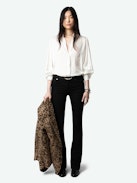 Trenta Satin Blouse - Long-sleeved white satin blouse with buttoned V-neck and gathered shoulders.