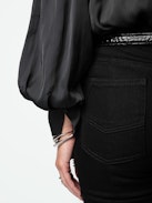 Trenta Satin Blouse - Long-sleeved black satin blouse with buttoned V-neck and gathered shoulders.