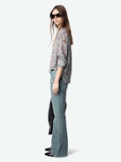 Tink Blouse - Effortless, airy, and endlessly versatile. The Tink blouse flows with a laid-back silhouette, delicate fabric, and just the right amount of undone attitude. Wear it loose, tuck it in—make it yours.