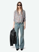 Tink Blouse - Effortless, airy, and endlessly versatile. The Tink blouse flows with a laid-back silhouette, delicate fabric, and just the right amount of undone attitude. Wear it loose, tuck it in—make it yours.