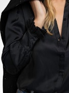 Camicia Thely Satin - Camicia in raso, maniche lunghe, chiusura con bottoni e strass a forma d'ala sul retro.