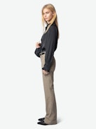 Thely Satin Shirt - Satin shirt with long sleeves, button fastening, and a wing-shaped rhinestone detail on the back.