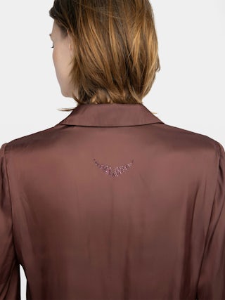 Thely Satin Shirt - Satin shirt, long sleeves, button fastening and rhinestone wing on the back.
