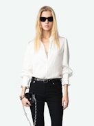 Thely Satin Shirt - Women's white satin blouse with long sleeves, gathered cuffs, and fishnet wings embroidery on the back.