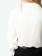 Thely Satin Shirt - Women's white satin blouse with long sleeves, gathered cuffs, and fishnet wings embroidery on the back.