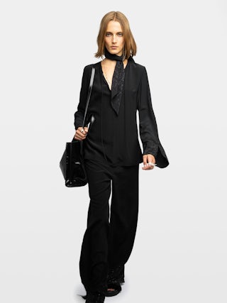 Blouse Turi - Blouse en viscose avec strass, manches longues et décolleté.