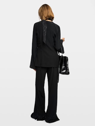 Blouse Turi - Blouse en viscose avec strass, manches longues et décolleté.