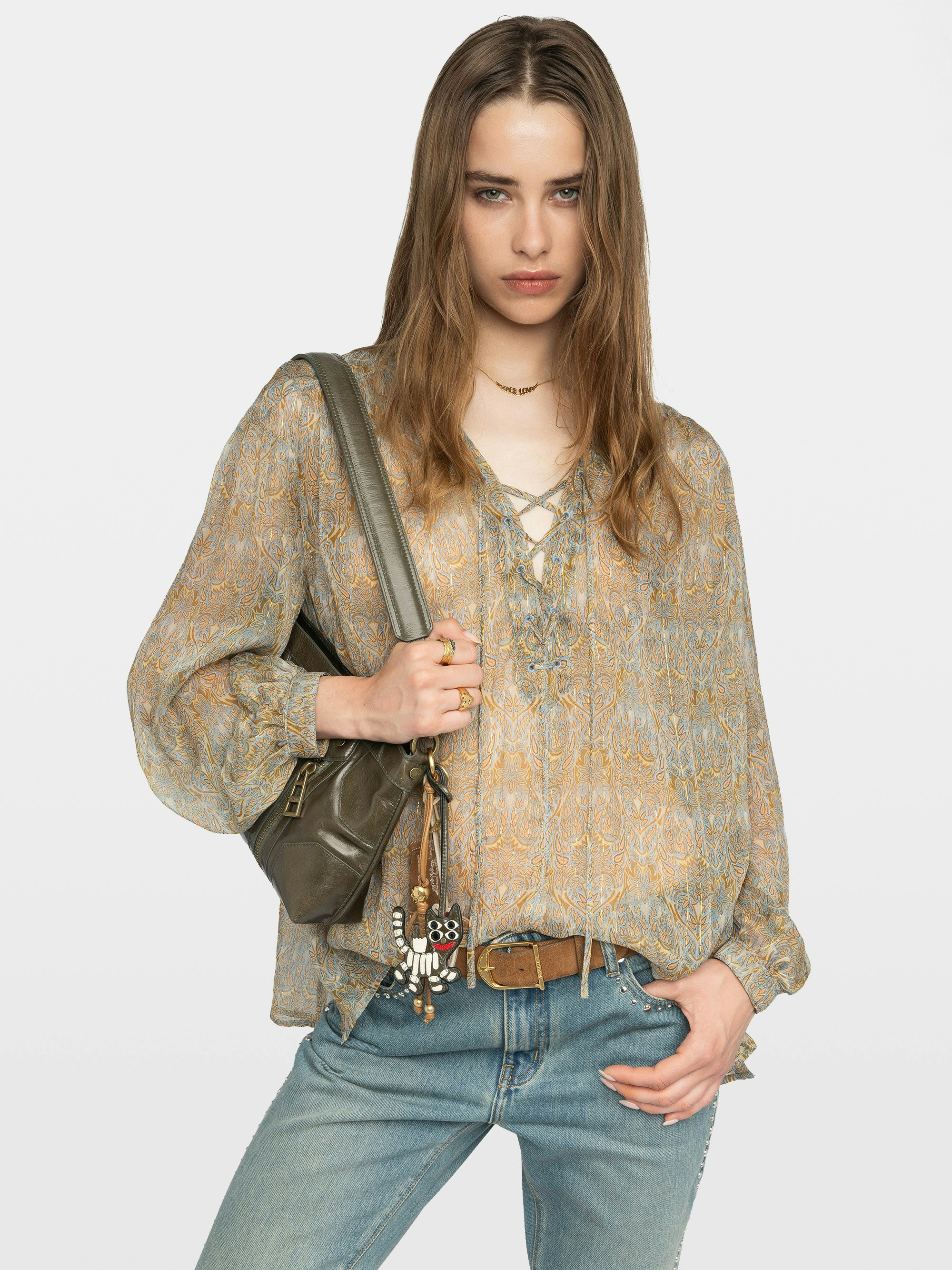 Tamela Shirt - Printed chiffon shirt with golden stripes, long balloon sleeves, western yoke and laced neckline.