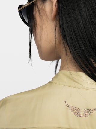 Tulba Satin Shirt - Satin shirt with pussy-bow collar, rhinestone wings on back and button fastening.