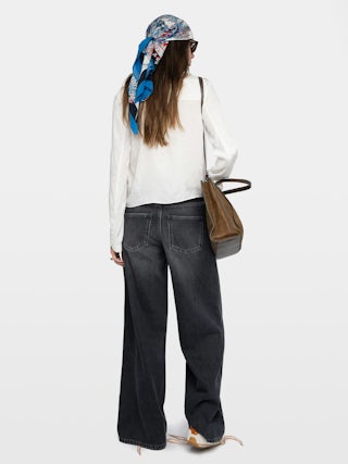 Chemise Tussi 100% Soie - Blouse en soie jacquard horses, manches longues et fermeture croisée boutonnée.