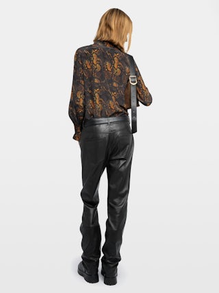 Chemise Thely 100% Soie - Chemise en soie imprimée, manches longues, fermeture boutonnée et ailes brodées au dos.