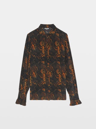 Chemise Thely 100% Soie - Chemise en soie imprimée, manches longues, fermeture boutonnée et ailes brodées au dos.