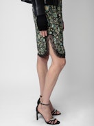 Falda Jozy 100% Seda - Falda lencera negra de seda de largo medio con estampado floral y bordes de encaje.