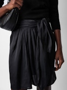 Joji Satin Skirt - Black satin miniskirt with pleats, split and tie at the waist.