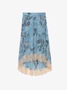 Falda de Seda Joslin Strass - Falda azul asimétrica de seda de estilo lencero de largo medio con estampado, encaje y strass.