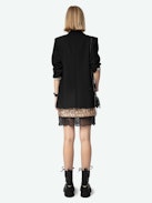Justicias Skirt - Gold miniskirt with sequins and lace.