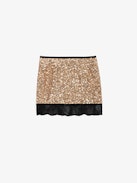 Justicias Skirt - Gold miniskirt with sequins and lace.