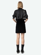Jinette Velvet Skirt - Black velvet mini skirt with pockets and zip fastening.