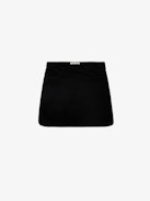 Jinette Velvet Skirt - Black velvet mini skirt with pockets and zip fastening.