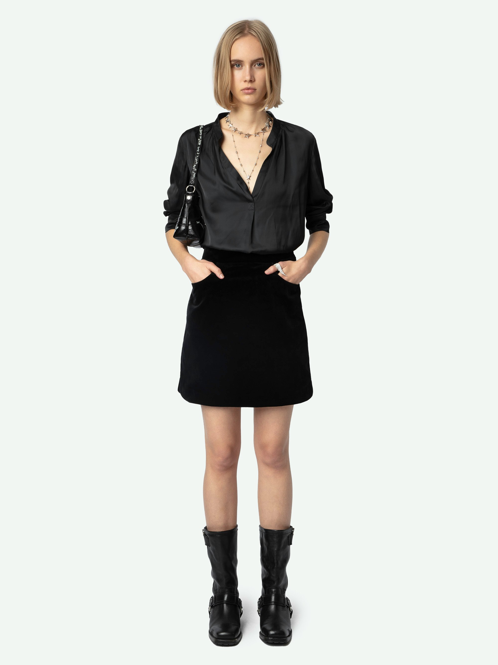 Jinette Velvet Skirt - Black velvet mini skirt with pockets and zip fastening.