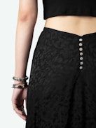 Jeanne Long Skirt 100% Silk Jacquard - Asymmetrical long skirt in leopard jacquard silk with V-cut and jewel buttons on the back.