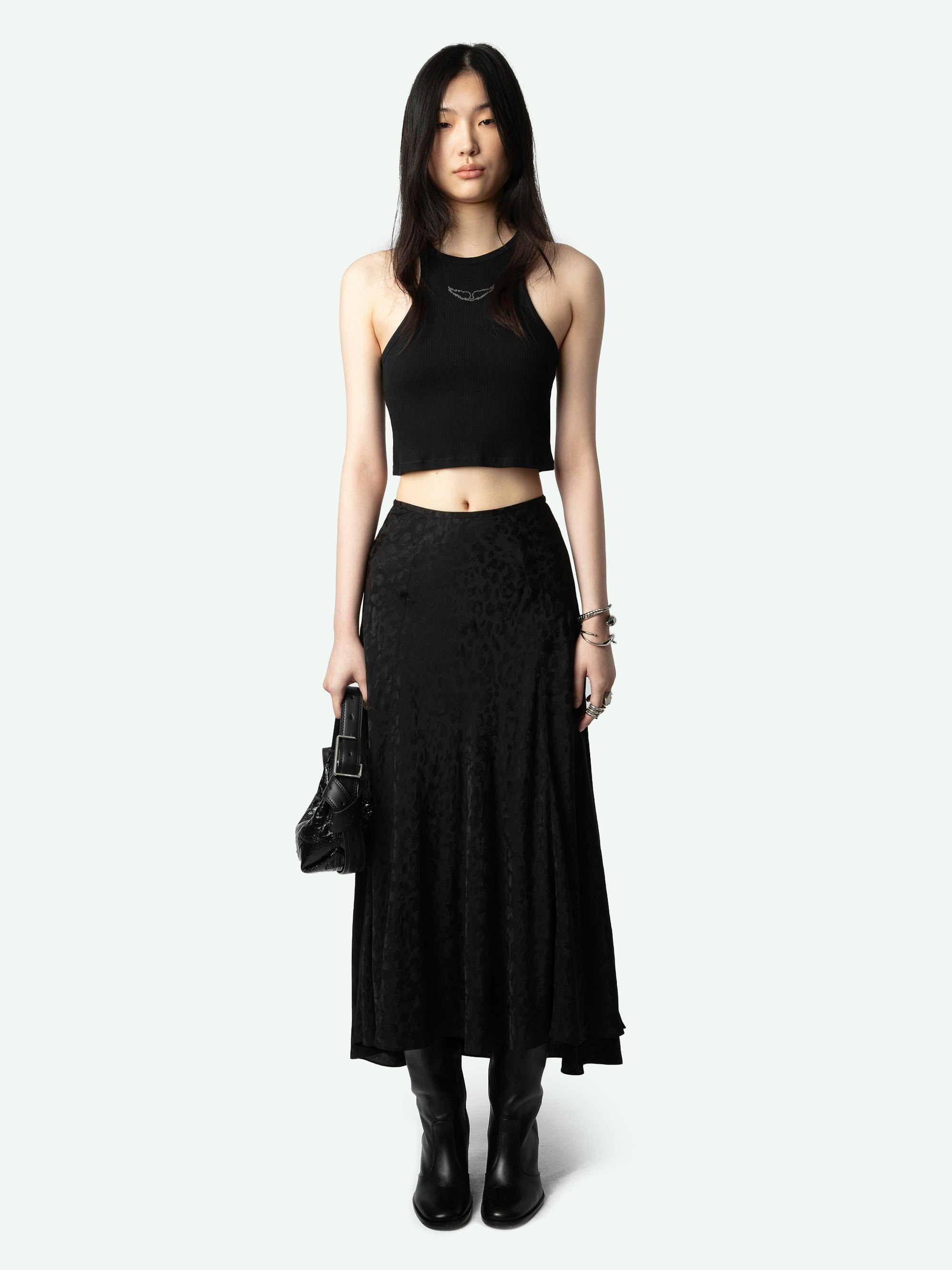 Jeanne Long Skirt 100% Silk Jacquard - Asymmetrical long skirt in leopard jacquard silk with V-cut and jewel buttons on the back.