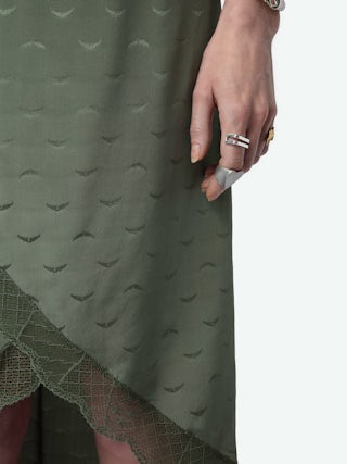 Jupe Jeudie 100% Soie - Jupe mi-longue asymétrique esprit lingerie en soie à jacquard ailes et bandes de dentelle.