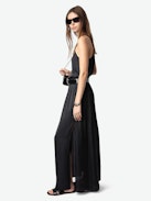 Jady Satin Skirt - Long black satin pleated skirt with slit, zip closure, and jewel button.