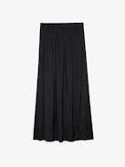 Jady Satin Skirt - Long black satin pleated skirt with slit, zip closure, and jewel button.