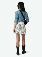 Jocky Skirt - Short printed cotton skirt with elasticated waist and ladder lace insert.
