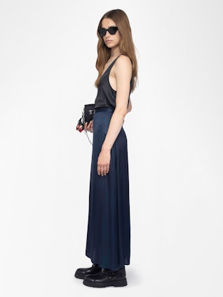 Jimeno Satin Skirt - Long viscose satin skirt with back slit, zip fastening and metal wings on the belt.