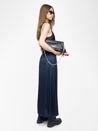 Jimeno Satin Skirt - Long viscose satin skirt with back slit, zip fastening and metal wings on the belt.