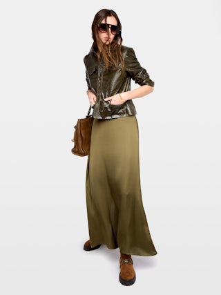 Jimeno Satin Skirt - Long skirt in viscose satin with back slit, zip closure and metal wings on belt.