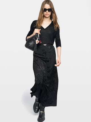 Jimeno Skirt 100% Silk - Long silk skirt with jacquard chain pattern, back slit, zip fastening and metallic wings on the waistband.