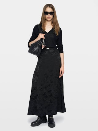 Jimeno Skirt 100% Silk - Long silk skirt with jacquard chain pattern, back slit, zip fastening and metallic wings on the waistband.