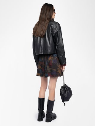 Jadys Skirt - Short chiffon skirt with print and slit, zip fastening.